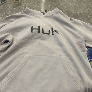 Women’s medium Huk sweatshirt.